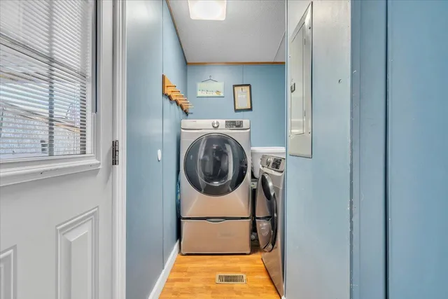 a view of swimming pool with outdoor seating and city view