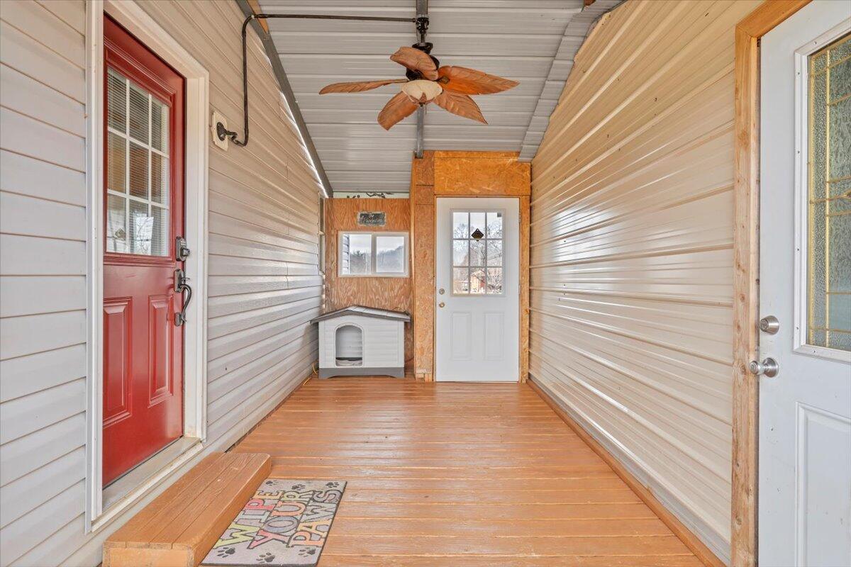627-641 Novelty Road Penhook, VA 24137 - Photo 46 of 69 a view of a hallway with a chandelier