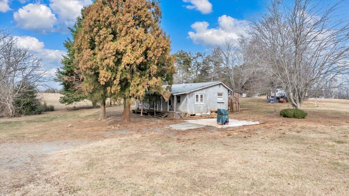 627-641 Novelty Road Penhook, VA 24137 - Photo 54 of 69 a view of a yard with a tree