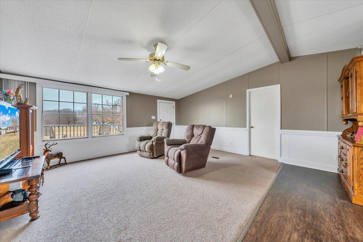 627-641 Novelty Road Penhook, VA 24137 - Photo 7 of 69 a bed room with furniture and a flat screen tv