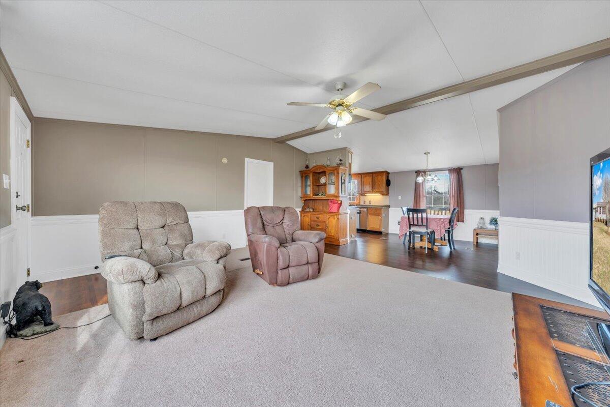 627-641 Novelty Road Penhook, VA 24137 - Photo 8 of 69 a living room with furniture and a chandelier