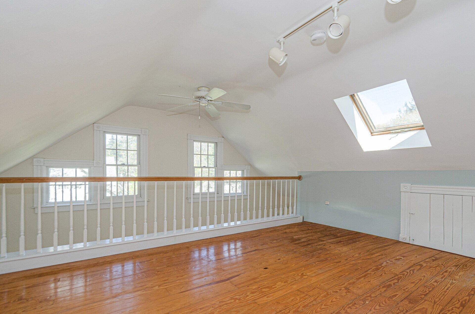 1089 Main Street Cotuit, MA 02635 - Photo 19 of 41 a view of an empty room with wooden floor