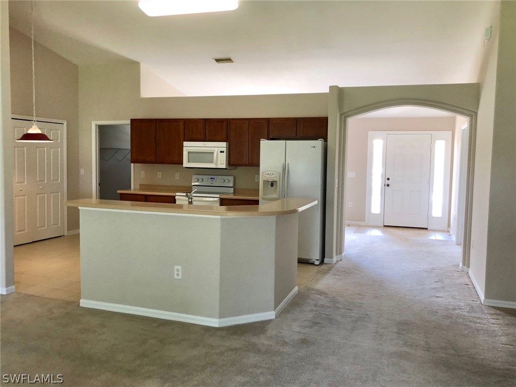 2502 Nature Pointe Loop Fort Myers, FL 33905 - Photo 5 of 5 a view of a kitchen with a sink