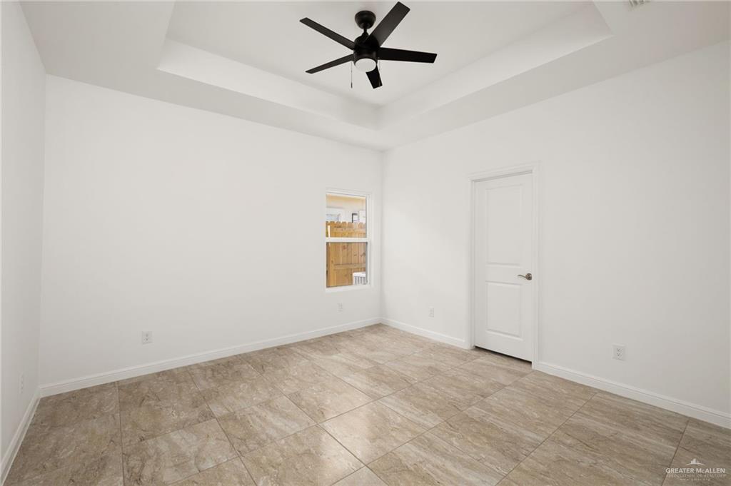 5304 Vision Street Rio Grande City, TX 78582 - Photo 14 of 26 wooden floor in an empty room