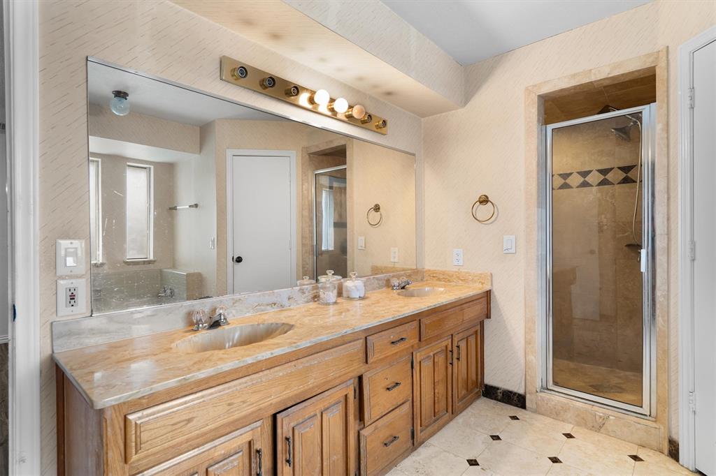 2214 Valley Mill Carrollton, TX 75006 - Photo 24 of 36 a bathroom with a sink double vanity and a mirror