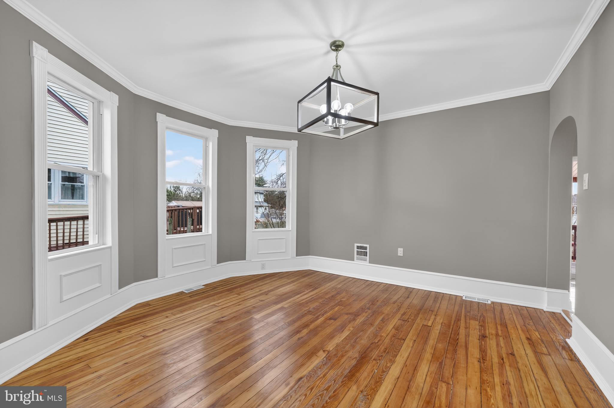 312 West Monroe Avenue Magnolia, NJ 08049 - Photo 19 of 43 a view of empty room with wooden floor and windows