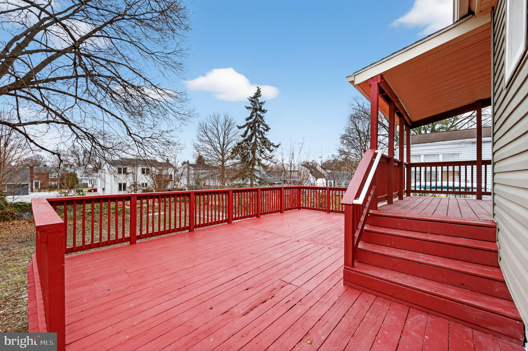 312 West Monroe Avenue Magnolia, NJ 08049 - Photo 37 of 43 a balcony with wooden floor and trees