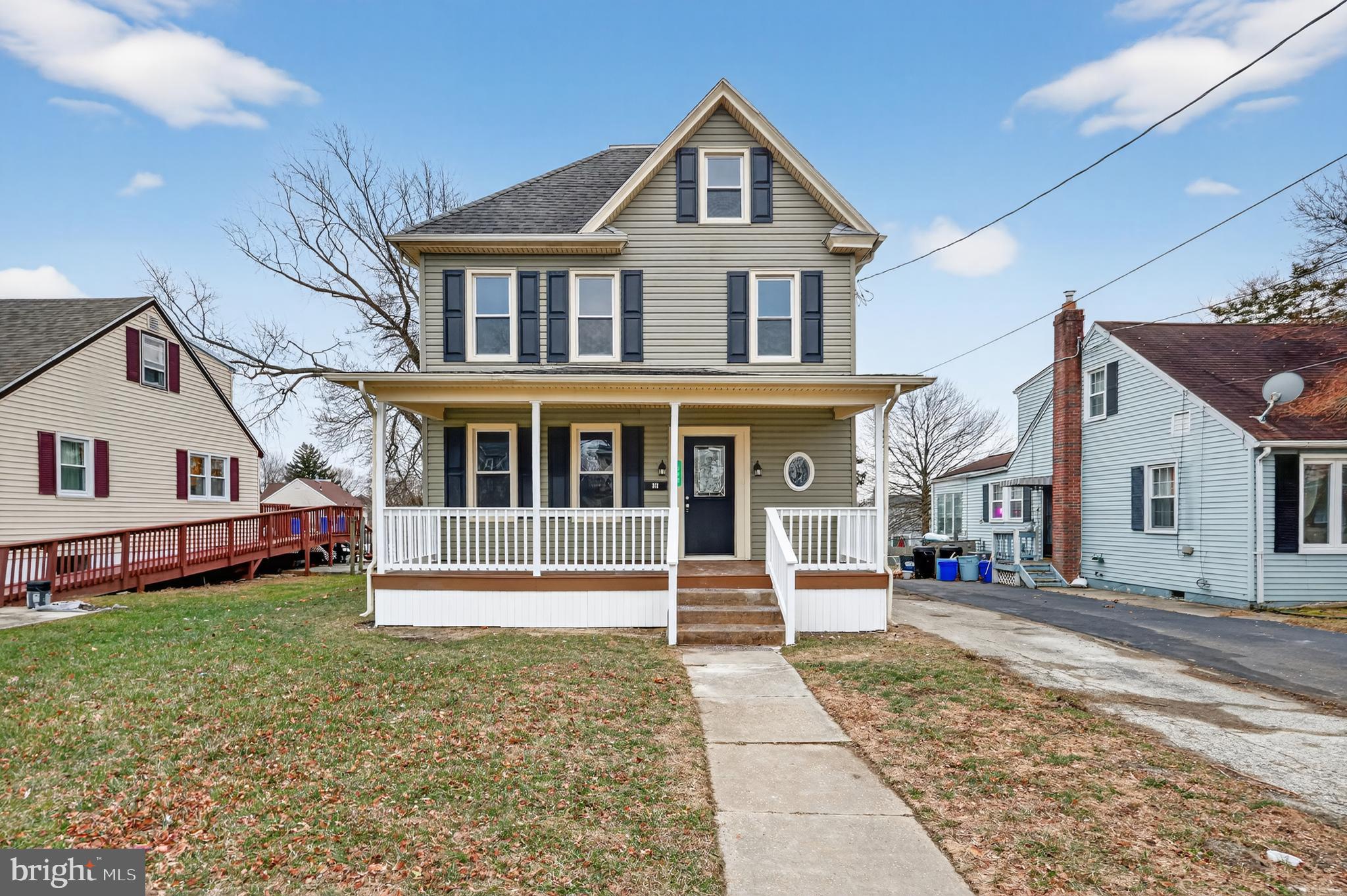312 West Monroe Avenue Magnolia, NJ 08049 - Photo 42 of 43 a front view of a house with a yard