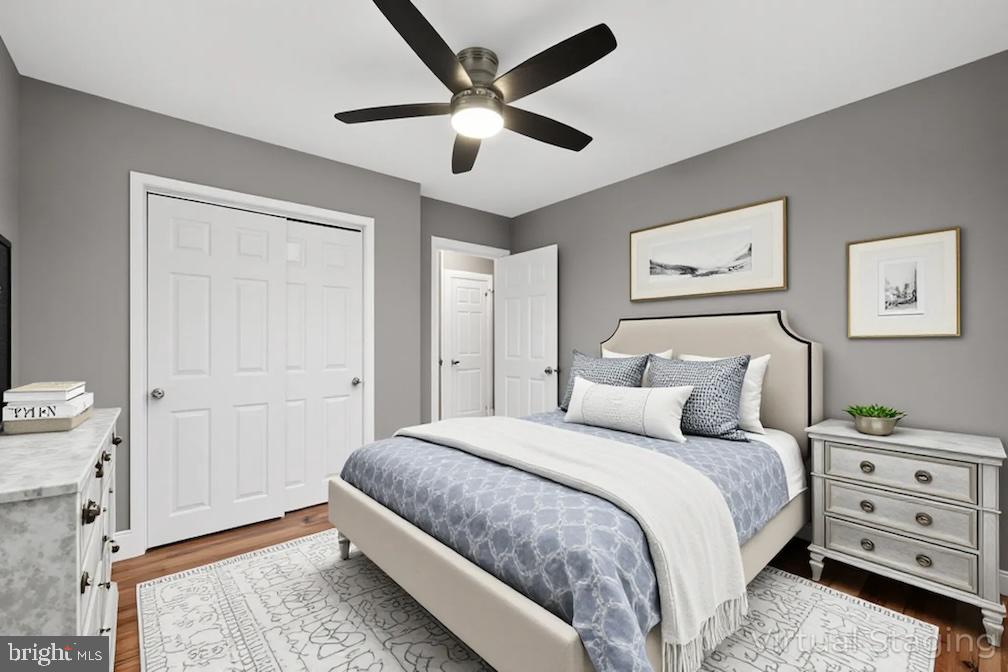 312 West Monroe Avenue Magnolia, NJ 08049 - Photo 7 of 43 a bedroom with a bed and a ceiling fan