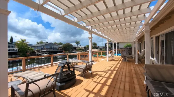 a view of a swimming pool with seating area