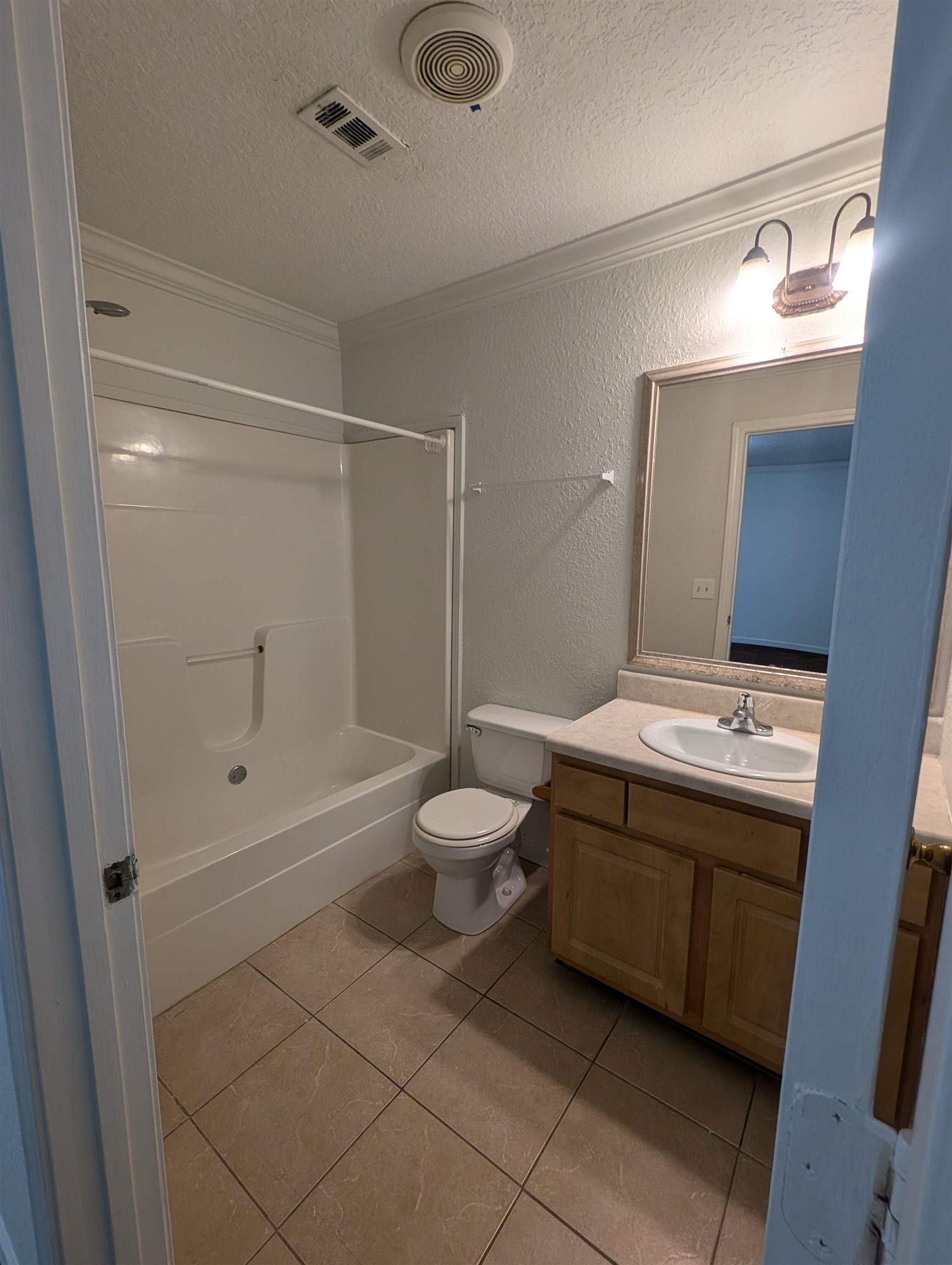 114 Cedar Street, Unit 4 St. Augustine, FL 32084 - Photo 21 of 33 a bathroom with a sink a toilet and shower