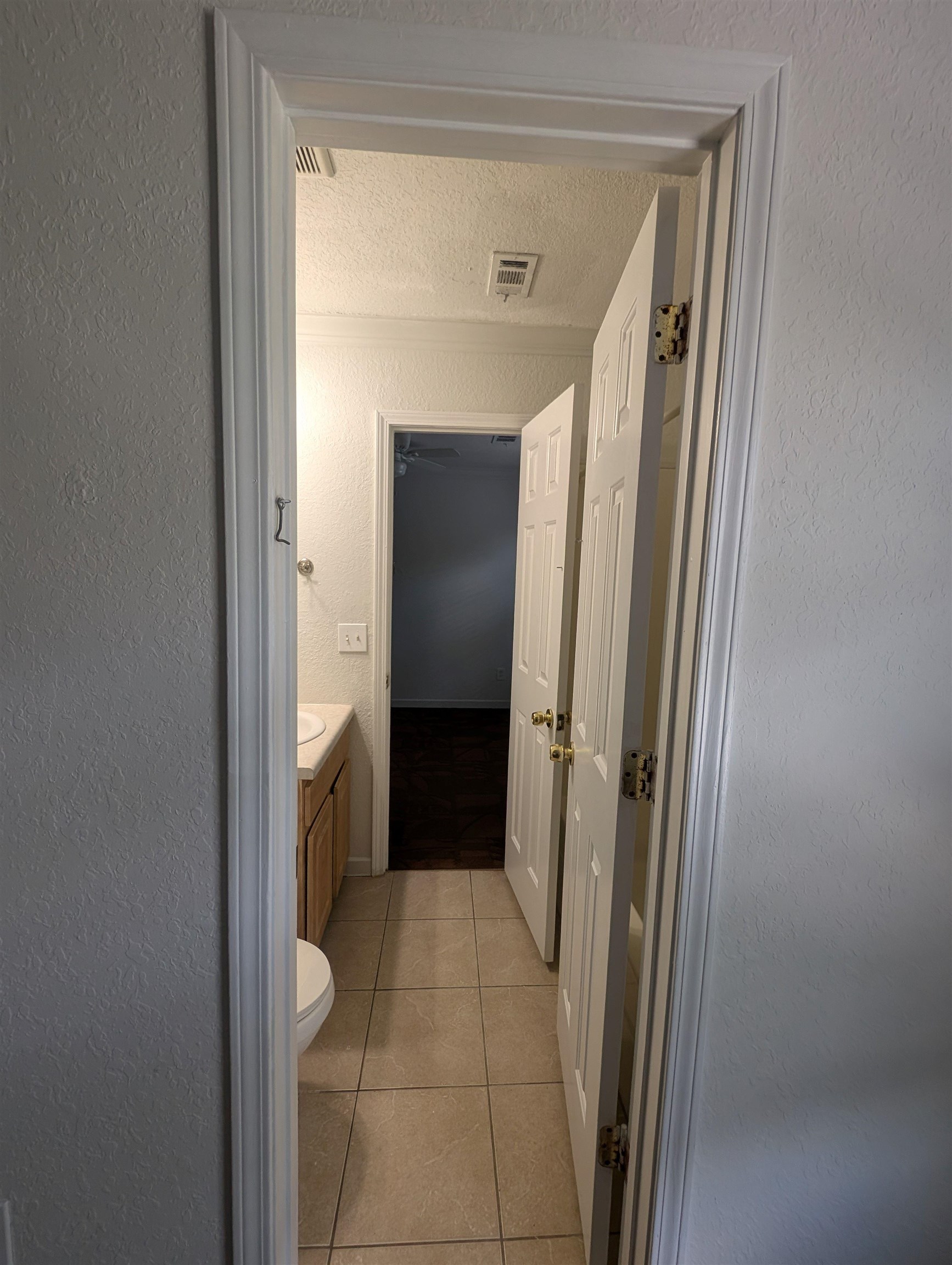 114 Cedar Street, Unit 4 St. Augustine, FL 32084 - Photo 23 of 33 a view of a bathroom from a hallway