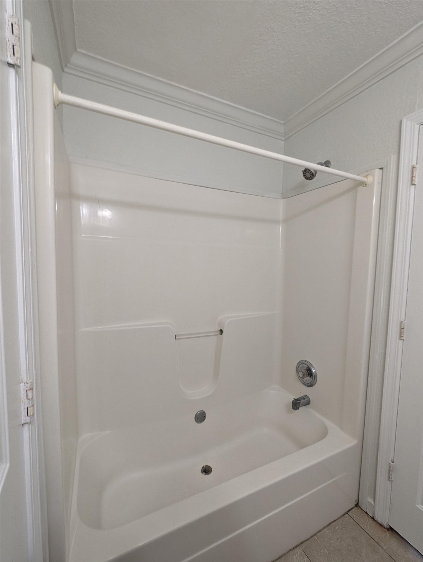 114 Cedar Street, Unit 4 St. Augustine, FL 32084 - Photo 25 of 33 a bathroom with a bathtub