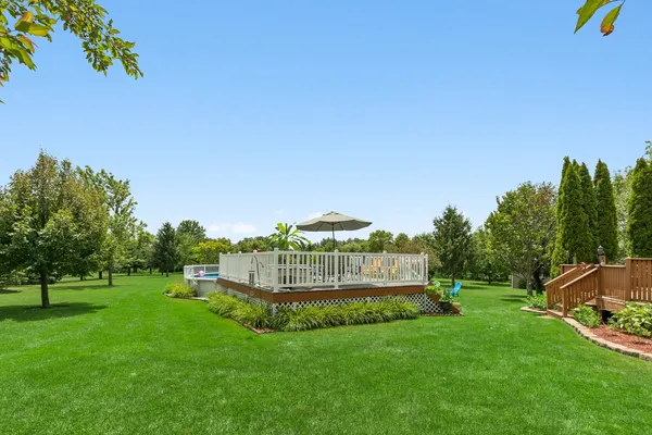 a garden view with a seating space