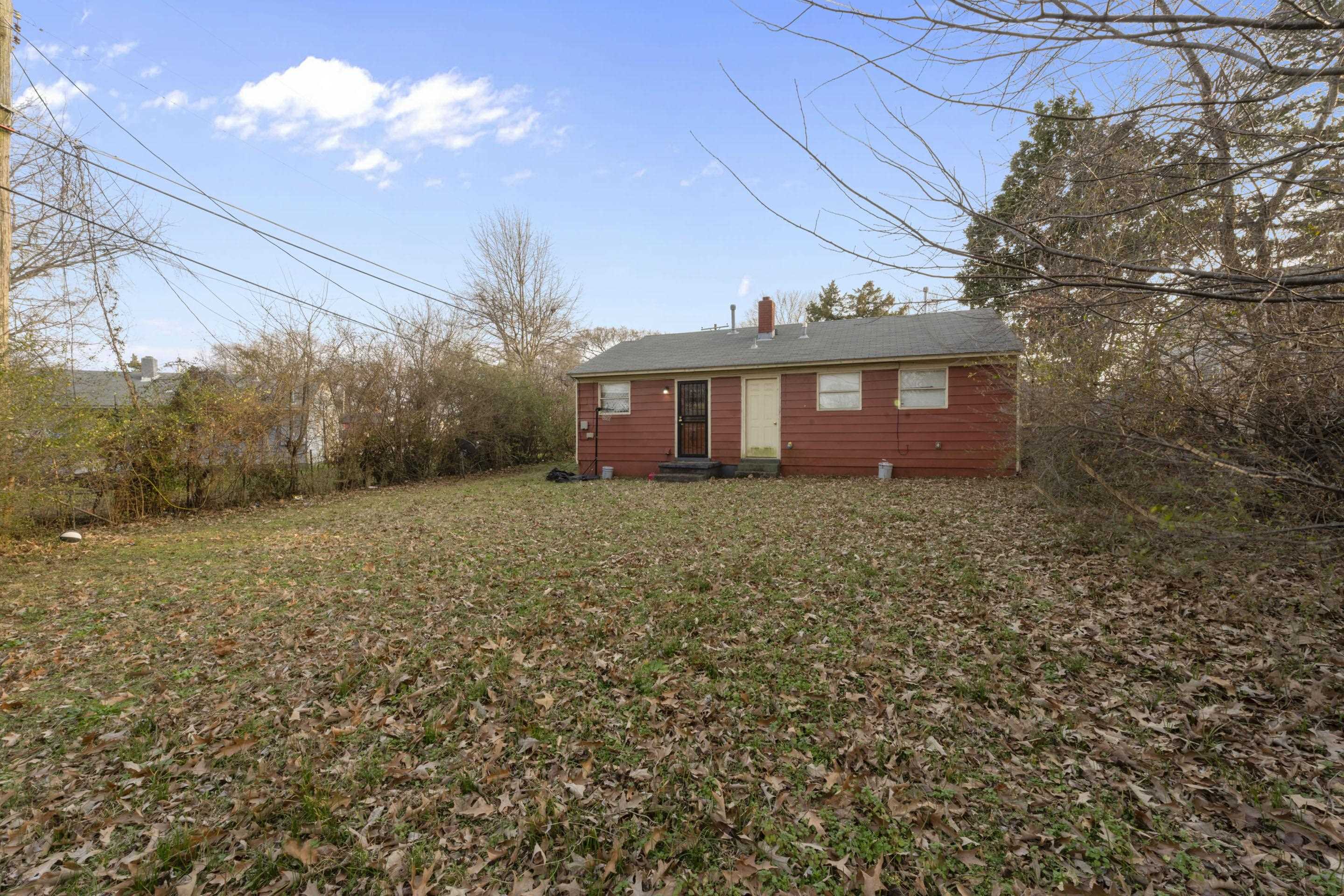 364 Elder Road Memphis, TN 38109 - Photo 11 of 11 a view of a house with a yard
