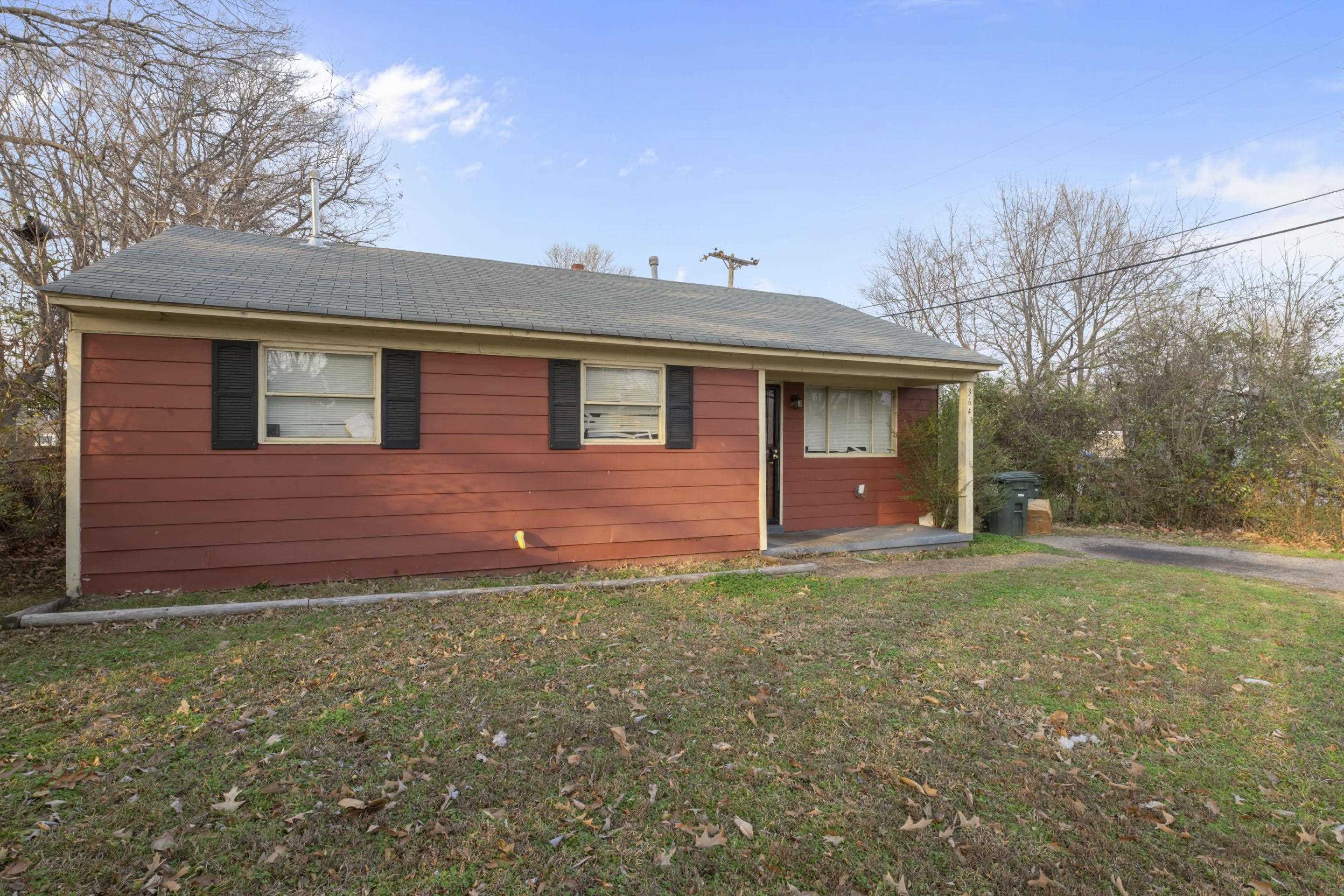 364 Elder Road Memphis, TN 38109 - Photo 4 of 11 a view of a house with a yard