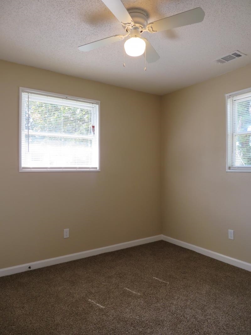 364 Elder Road Memphis, TN 38109 - Photo 7 of 11 an empty room with a window