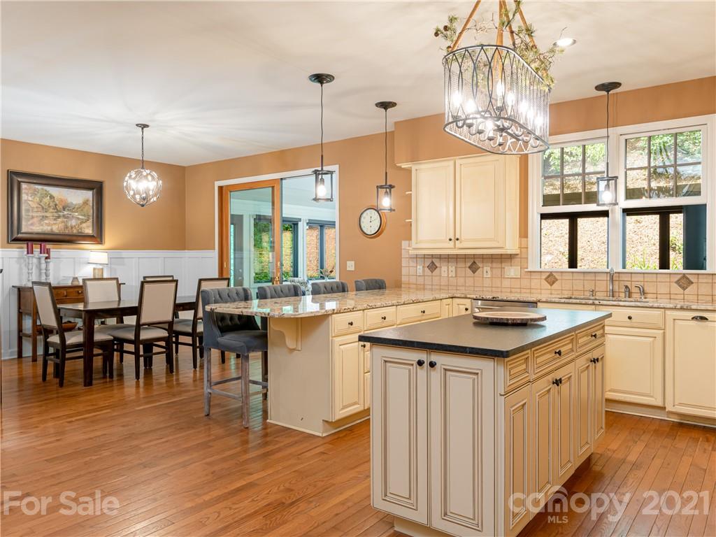 103 Windsong Drive Fairview, NC 28730 - Photo 11 of 36 a kitchen with lots of counter top space