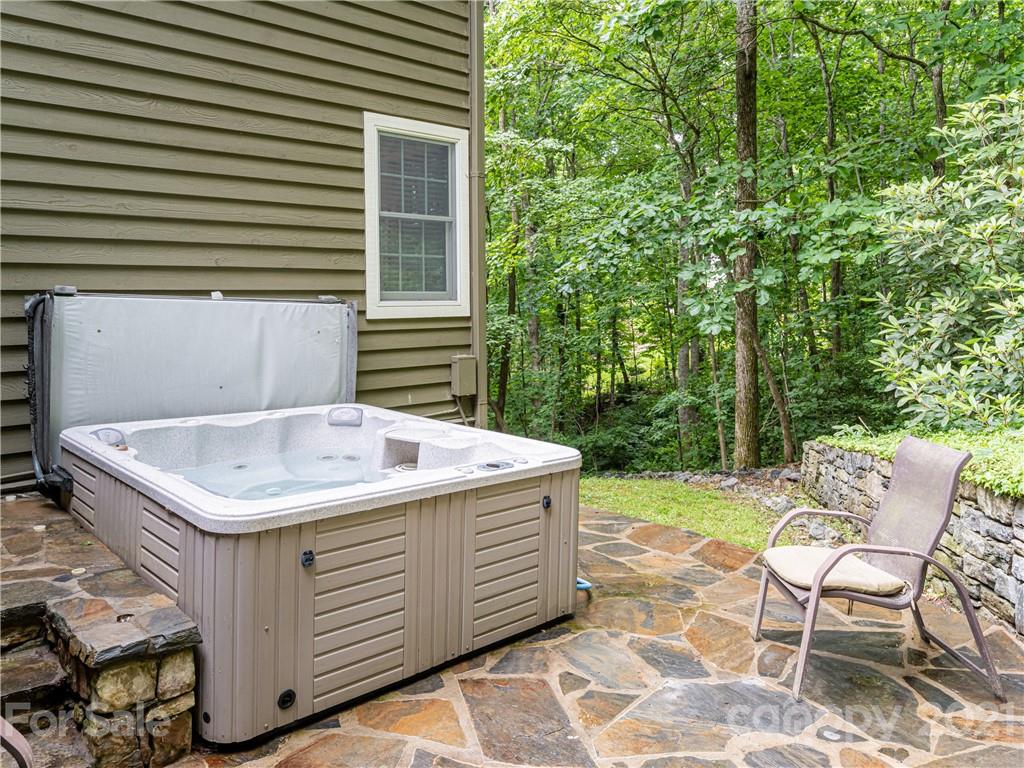 103 Windsong Drive Fairview, NC 28730 - Photo 32 of 36 a view of a kitchen with a sink and a chair