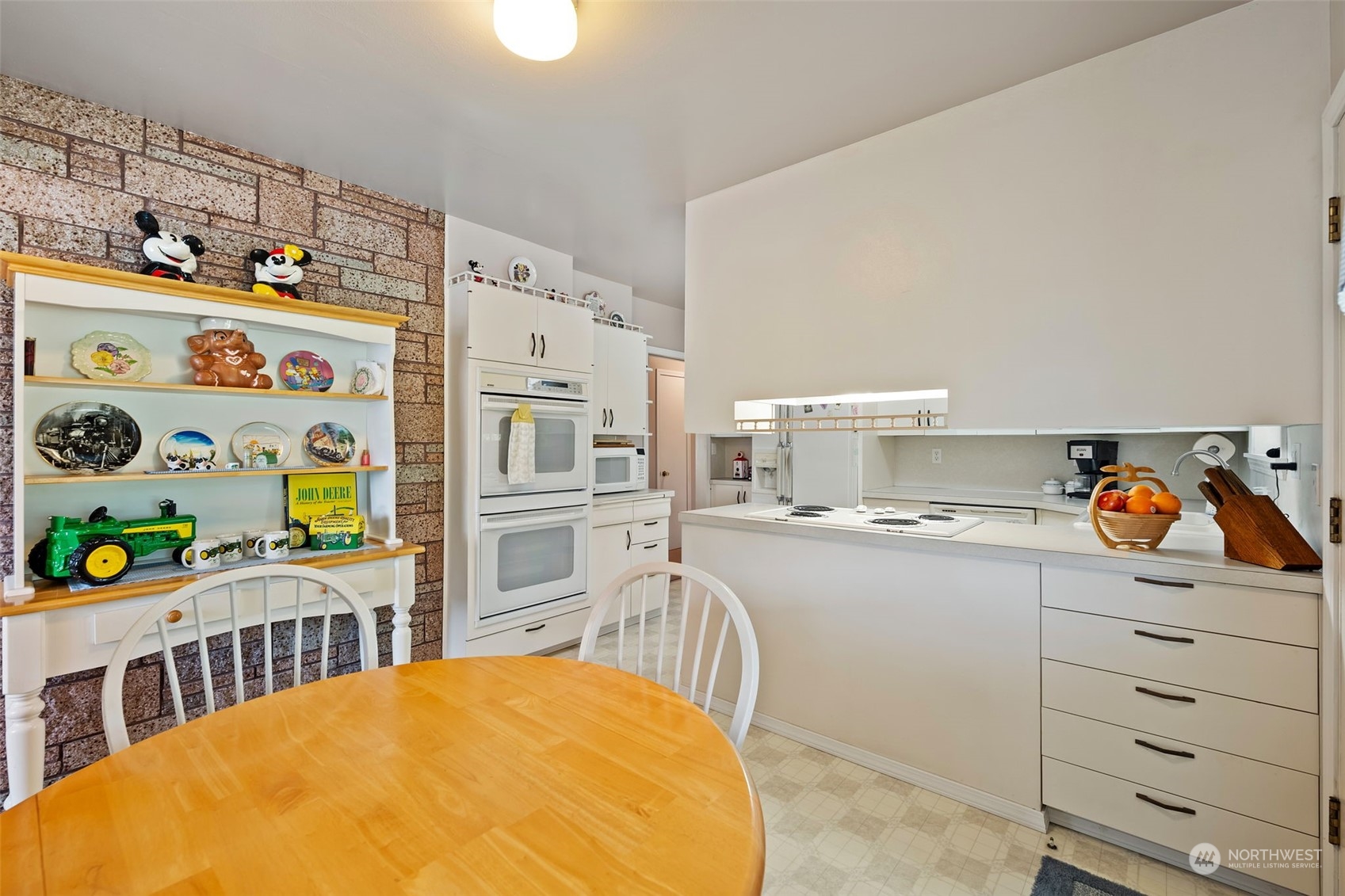 628 East Valley Road Skamokawa, WA 98647 - Photo 21 of 39 a kitchen with stainless steel appliances a sink and a refrigerator