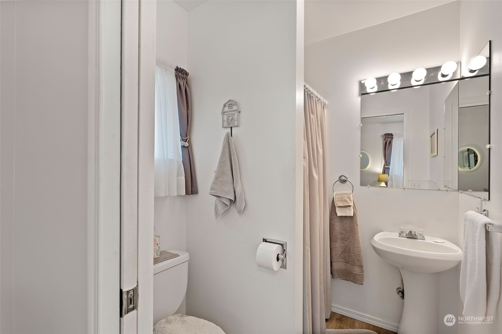 628 East Valley Road Skamokawa, WA 98647 - Photo 30 of 39 a bathroom with a sink toilet and shower