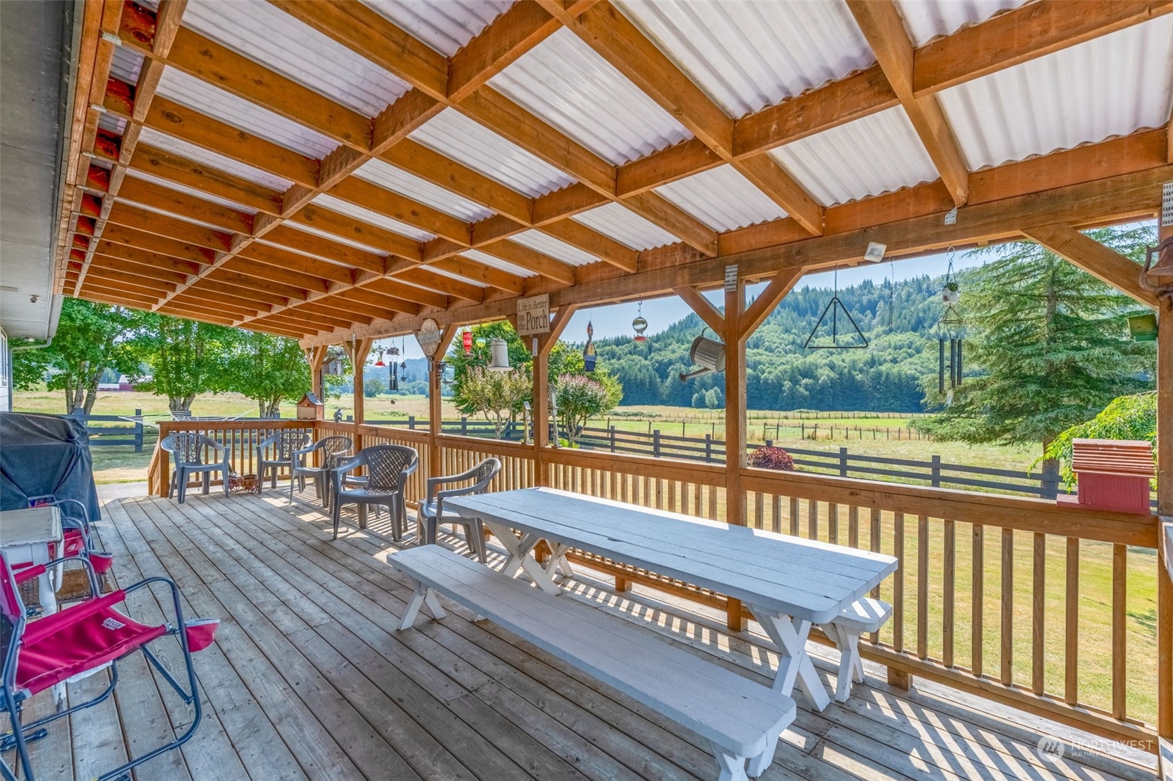 628 East Valley Road Skamokawa, WA 98647 - Photo 31 of 39 a view of a patio with wooden floor