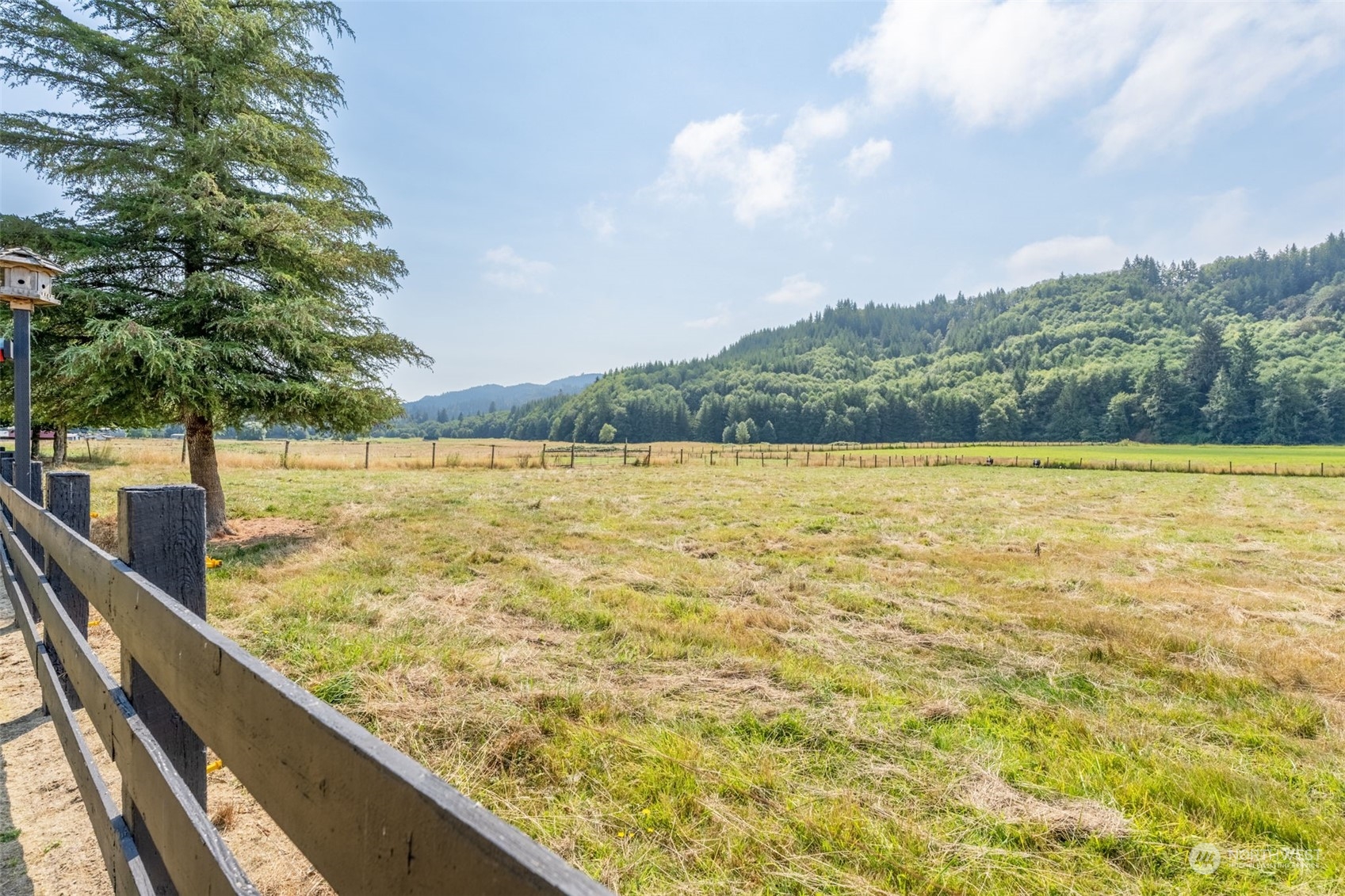 628 East Valley Road Skamokawa, WA 98647 - Photo 5 of 39 a view of a lake from a balcony