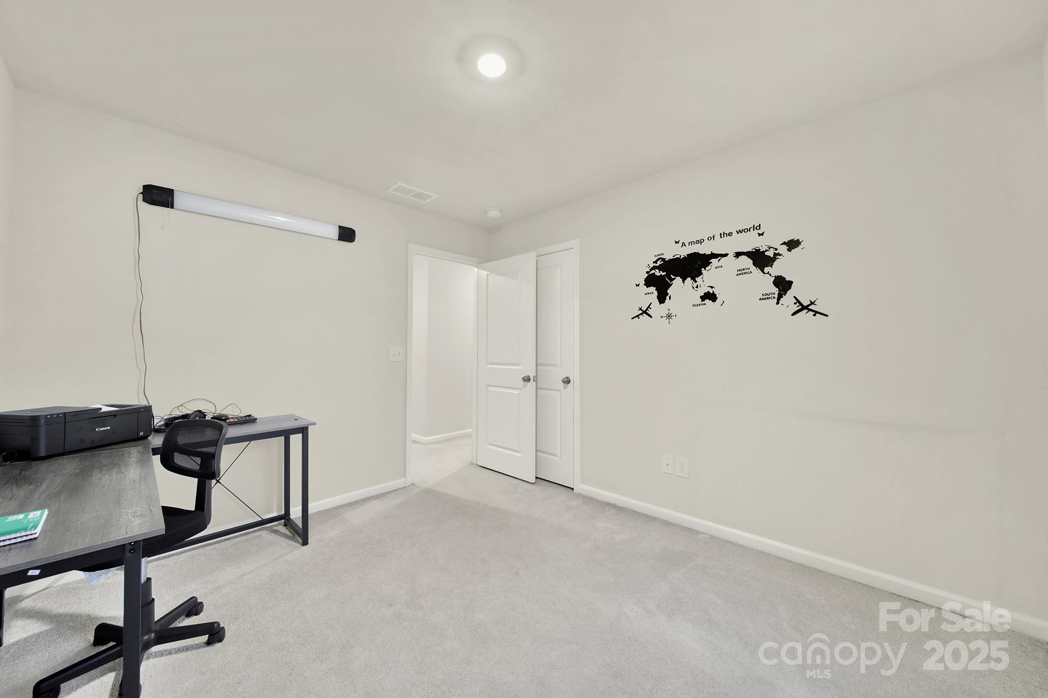 6009 Chelsea Oaks Ridge Fort Mill, SC 29708 - Photo 16 of 30 a view of a room with gym equipment