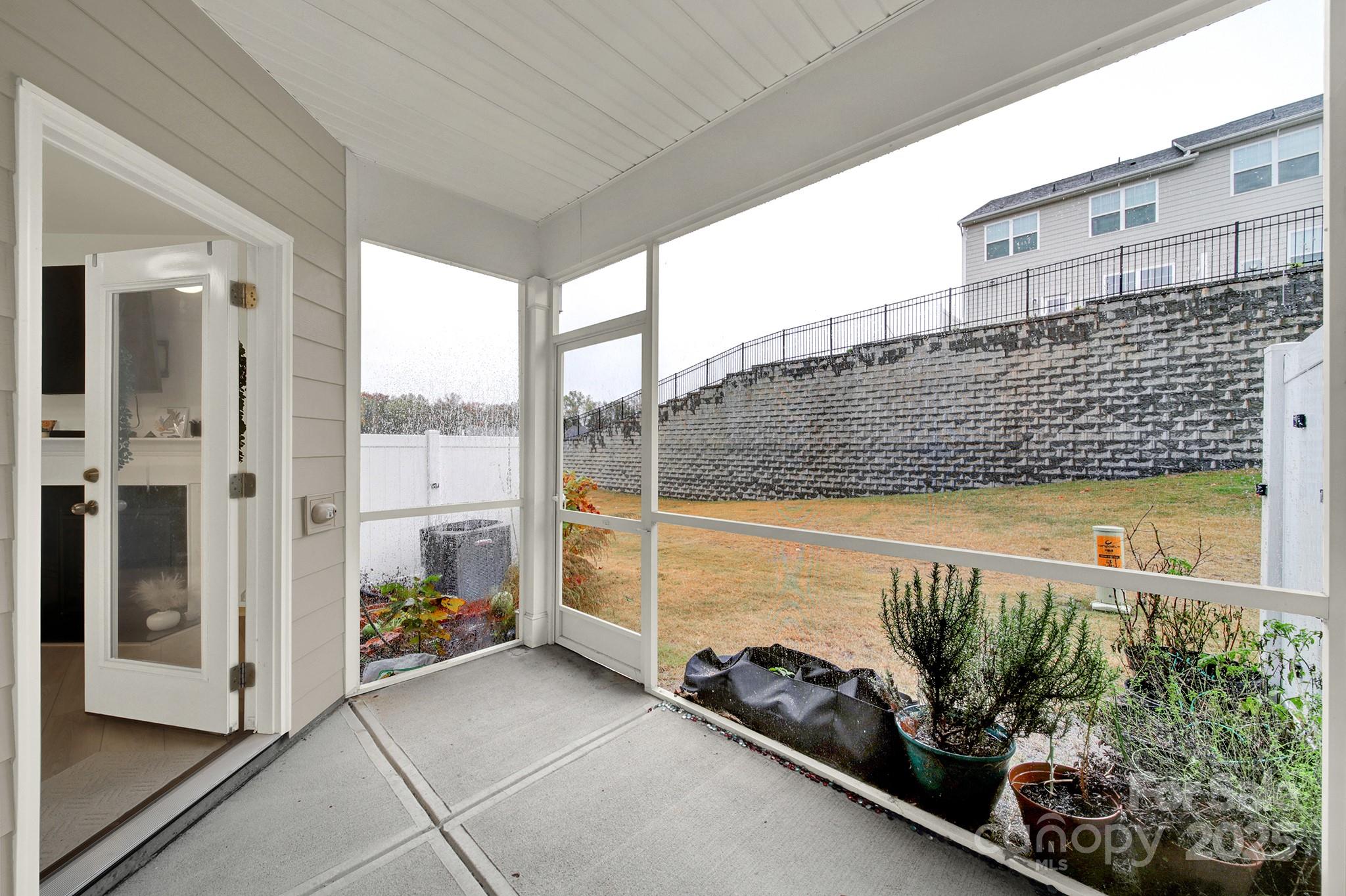 6009 Chelsea Oaks Ridge Fort Mill, SC 29708 - Photo 26 of 30 a view of a chairs and table in the balcony