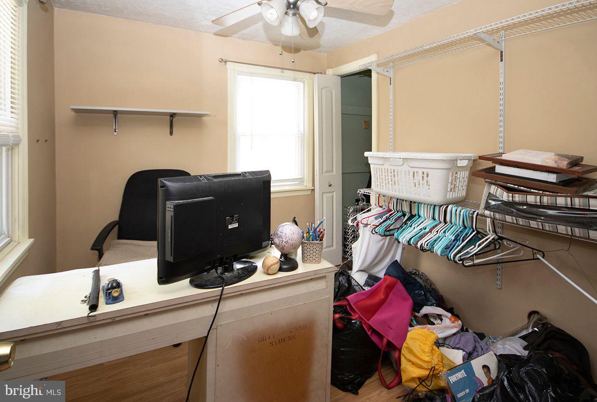 315 Cornell Road Glassboro, NJ 08028 - Photo 19 of 22 a bedroom with a bed and a mirror