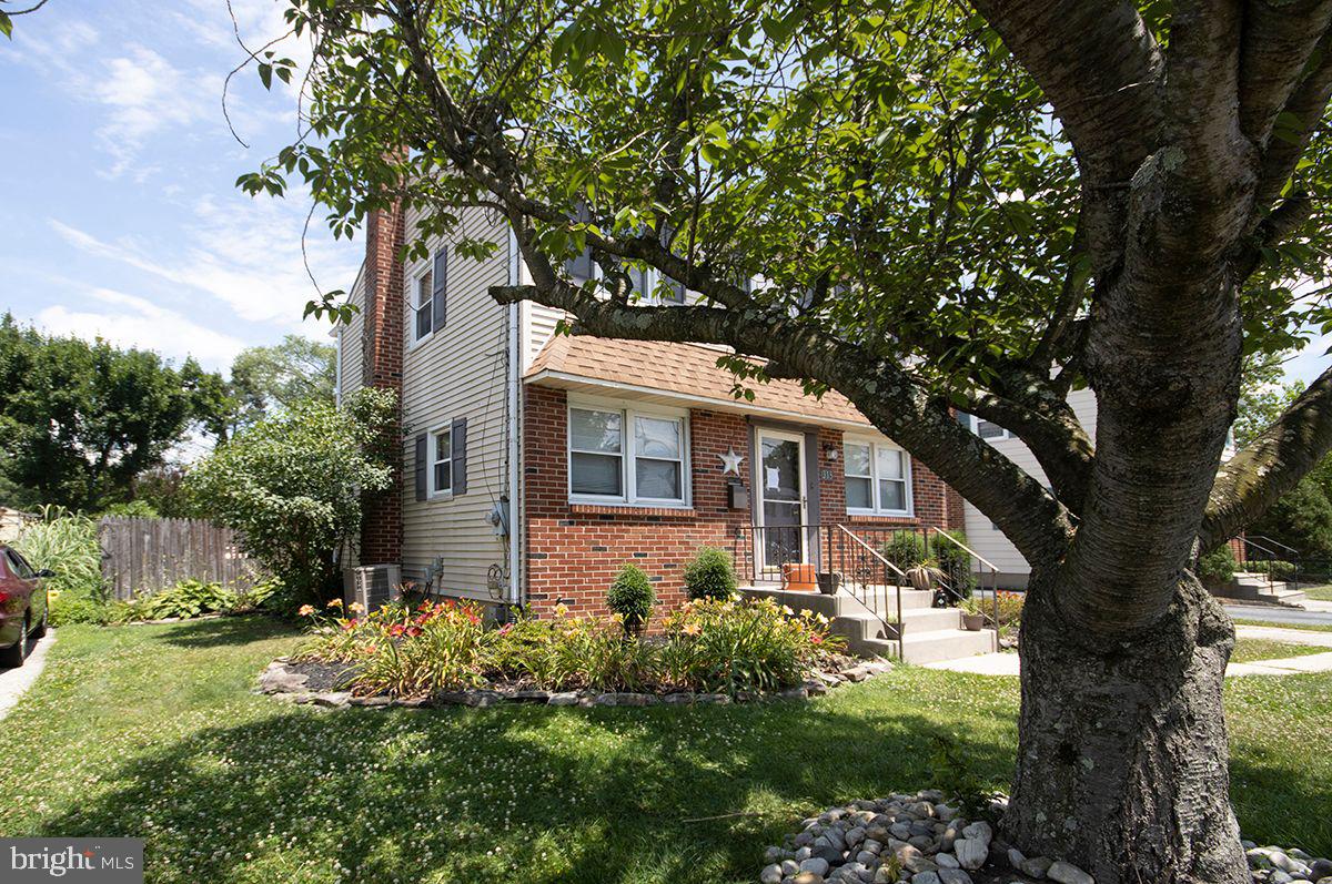 315 Cornell Road Glassboro, NJ 08028 - Photo 3 of 22 a front view of a house with garden