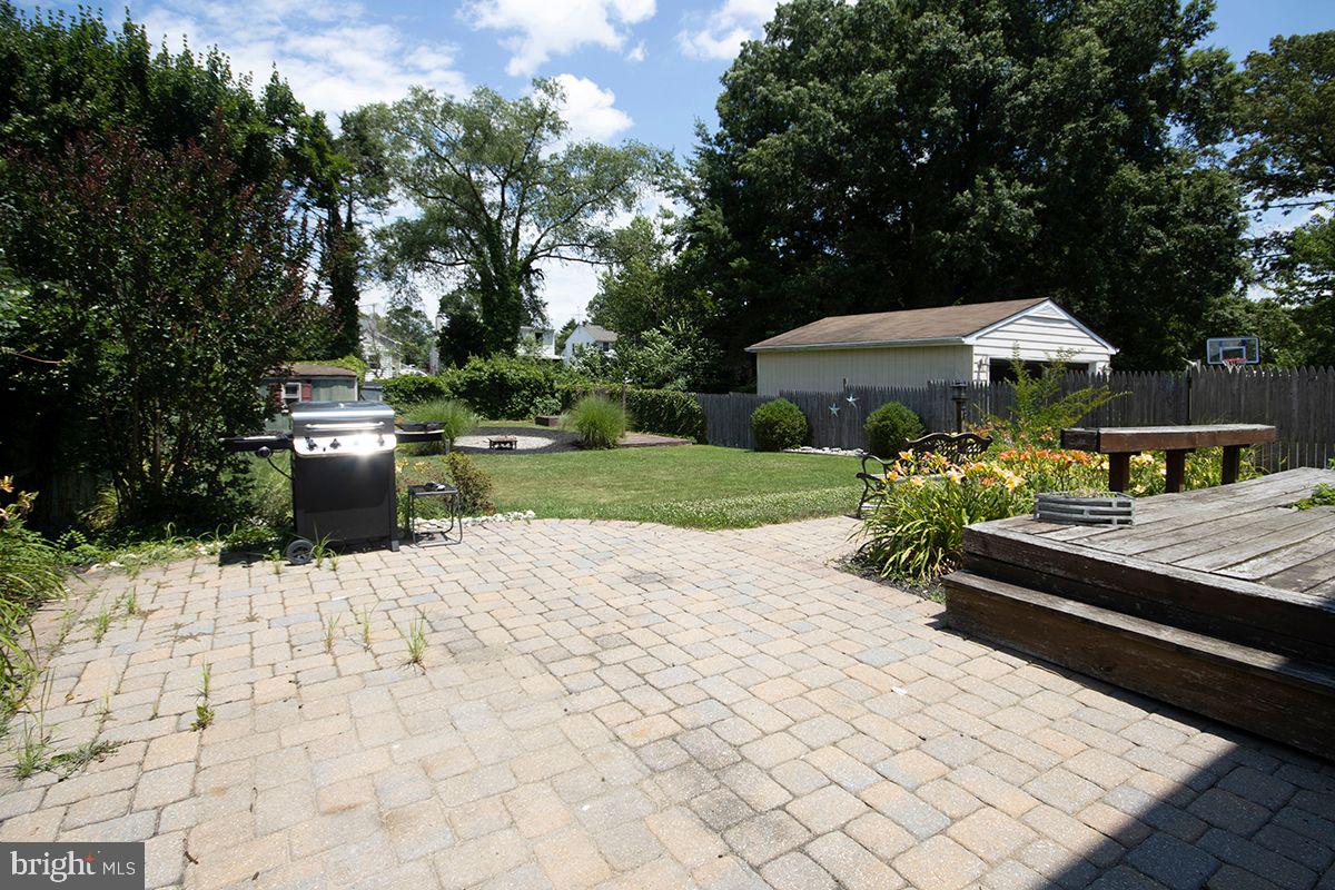 315 Cornell Road Glassboro, NJ 08028 - Photo 4 of 22 a front view of a house with a yard