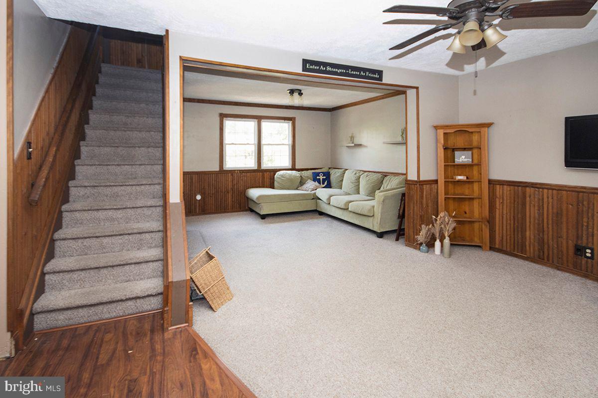 315 Cornell Road Glassboro, NJ 08028 - Photo 9 of 22 a living room with furniture and a wooden floor