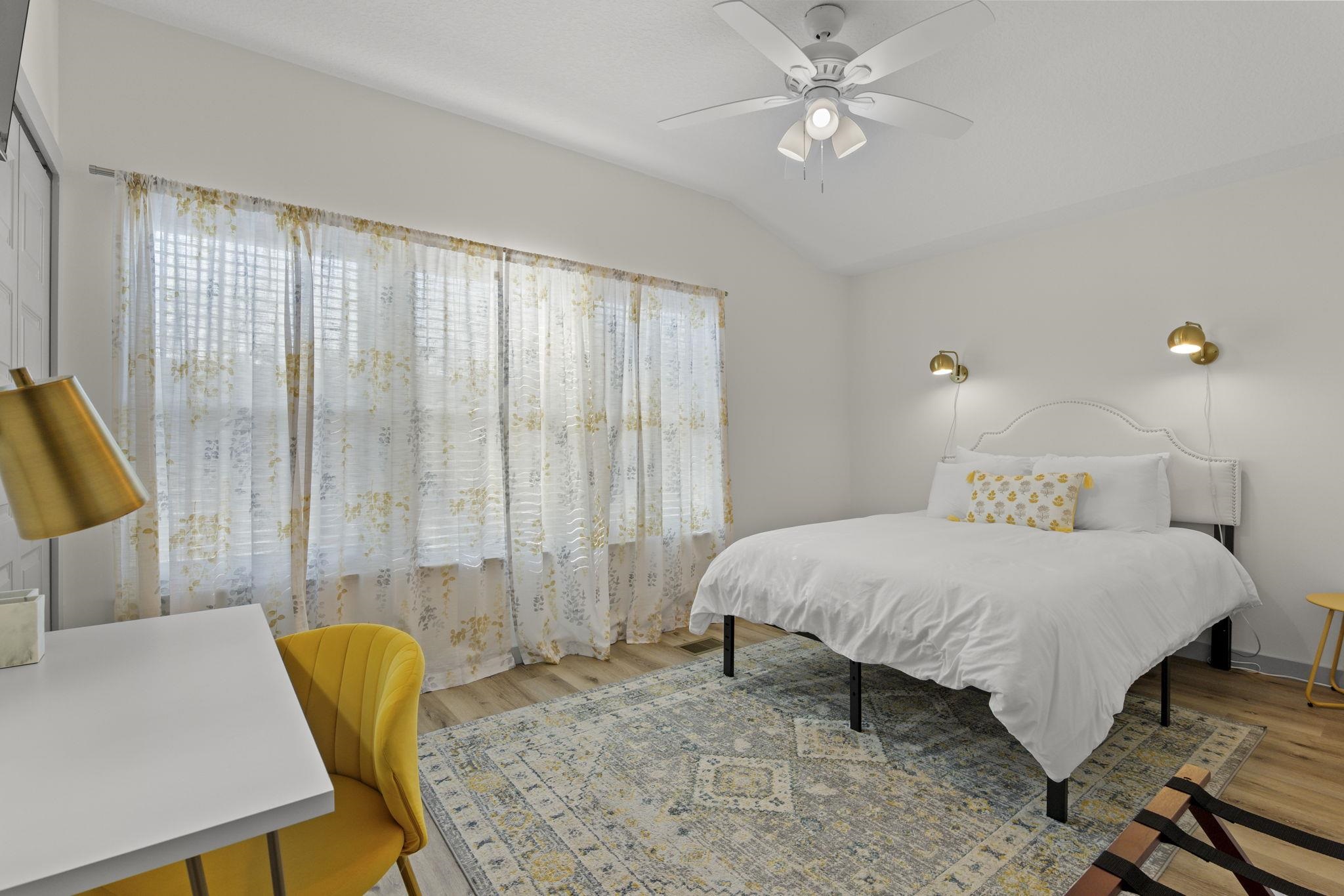 110 Moore Street St. Augustine, FL 32084 - Photo 14 of 39 a bedroom with a bed and a couch