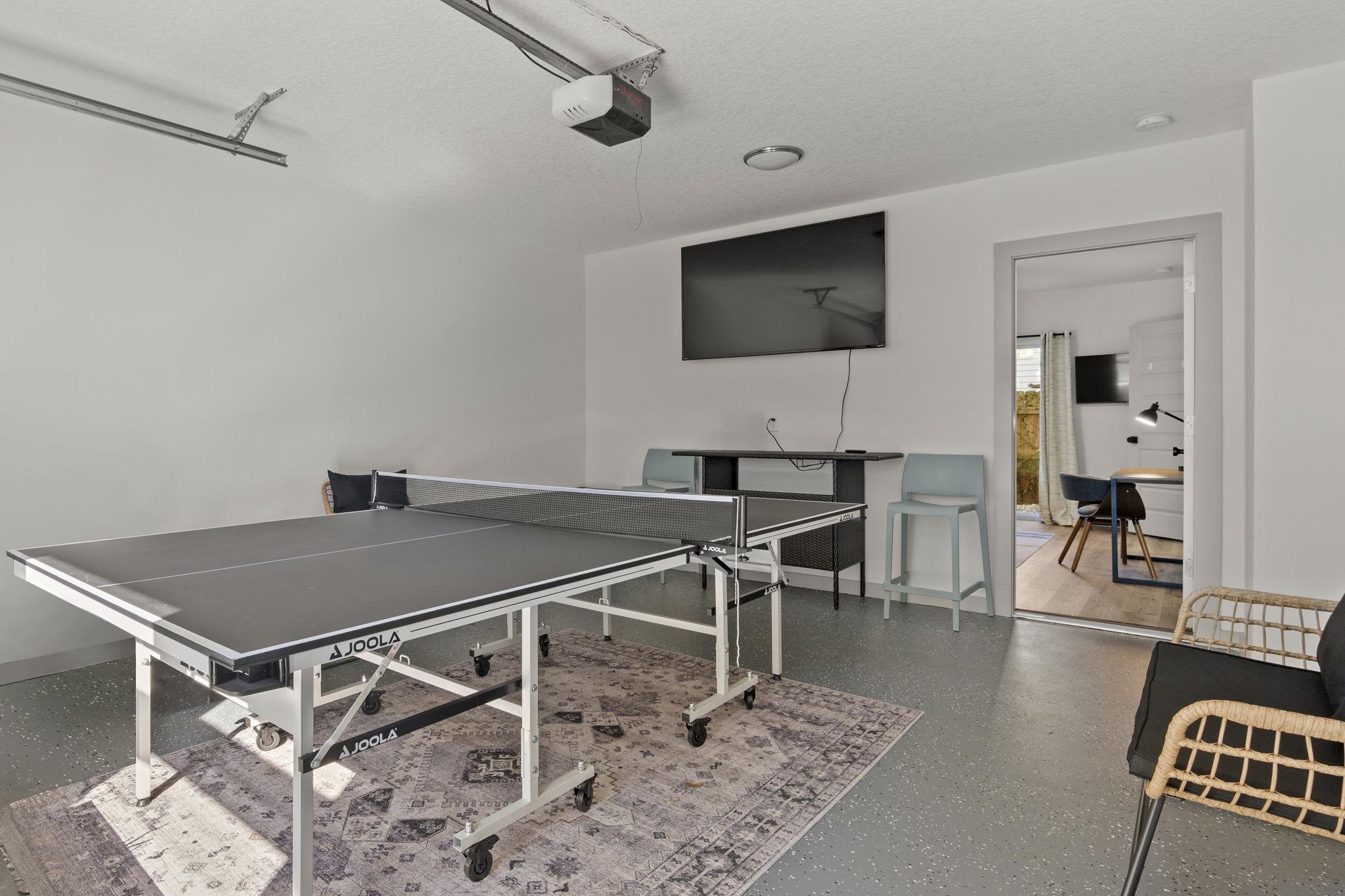 110 Moore Street St. Augustine, FL 32084 - Photo 25 of 39 a living room with a flat screen tv and outdoor view