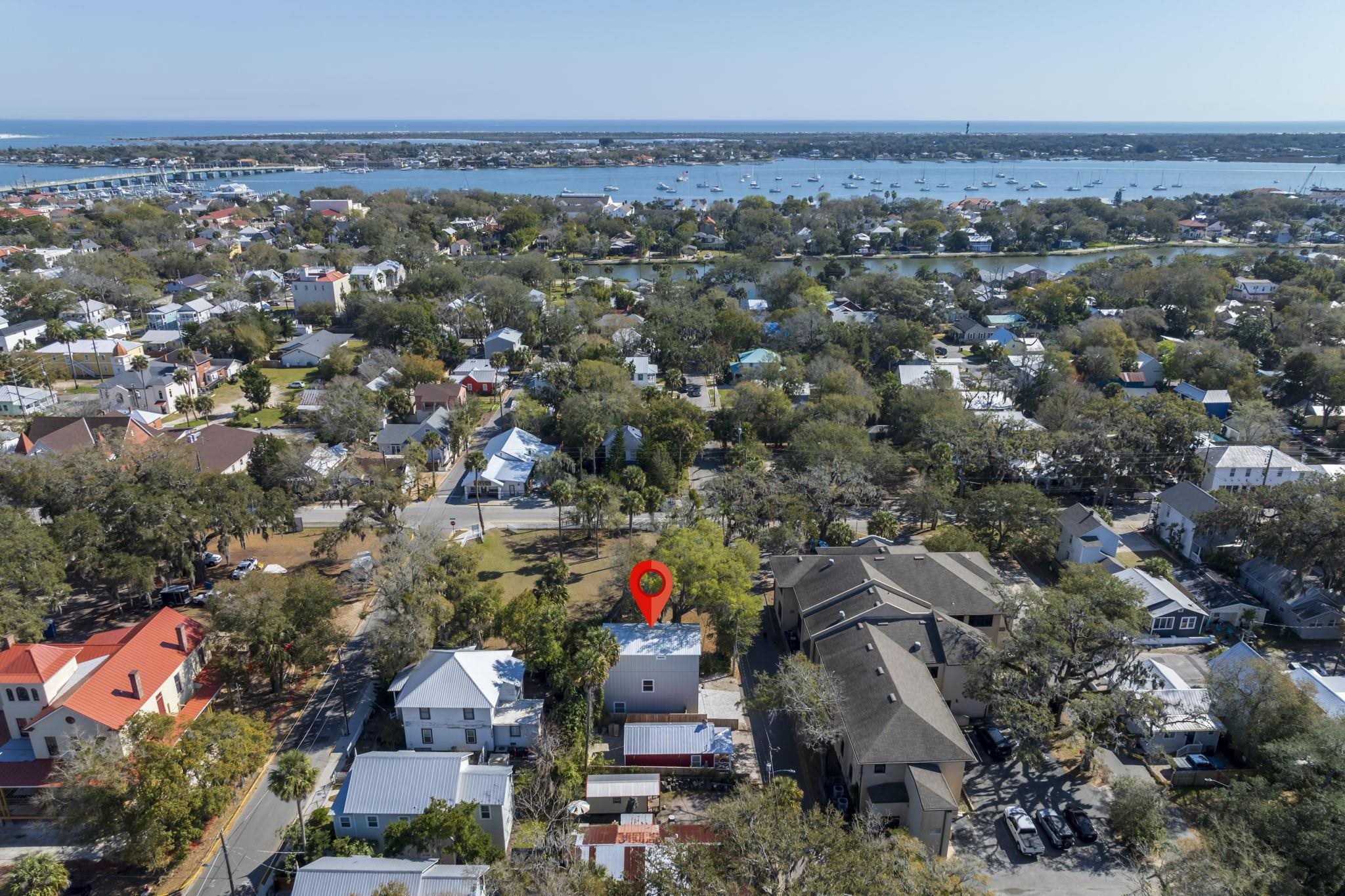 110 Moore Street St. Augustine, FL 32084 - Photo 32 of 39 an aerial view of house with outdoor space and trees all around