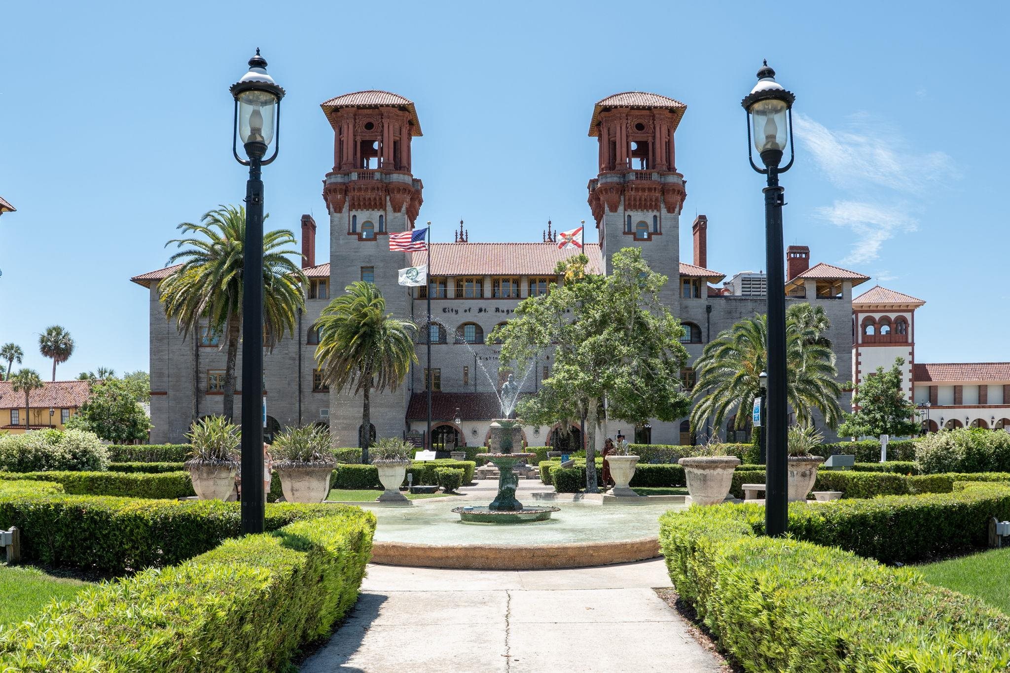 110 Moore Street St. Augustine, FL 32084 - Photo 35 of 39 a view of a street with potted plants and palm trees