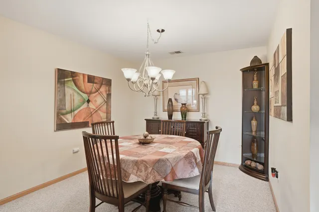 a bedroom with a large bed and a flat screen tv