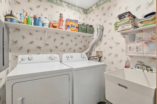 a view of a balcony with chairs