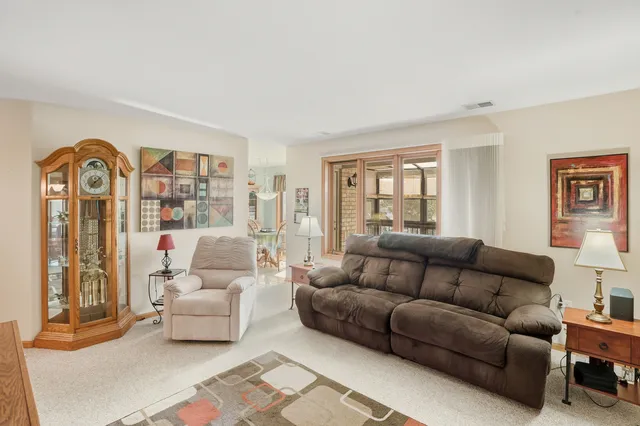 a kitchen with a sink cabinets and appliances