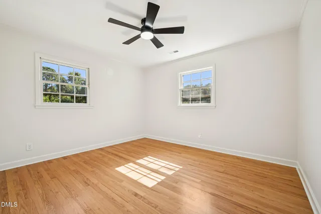 a view of a bathroom with a tub and shower