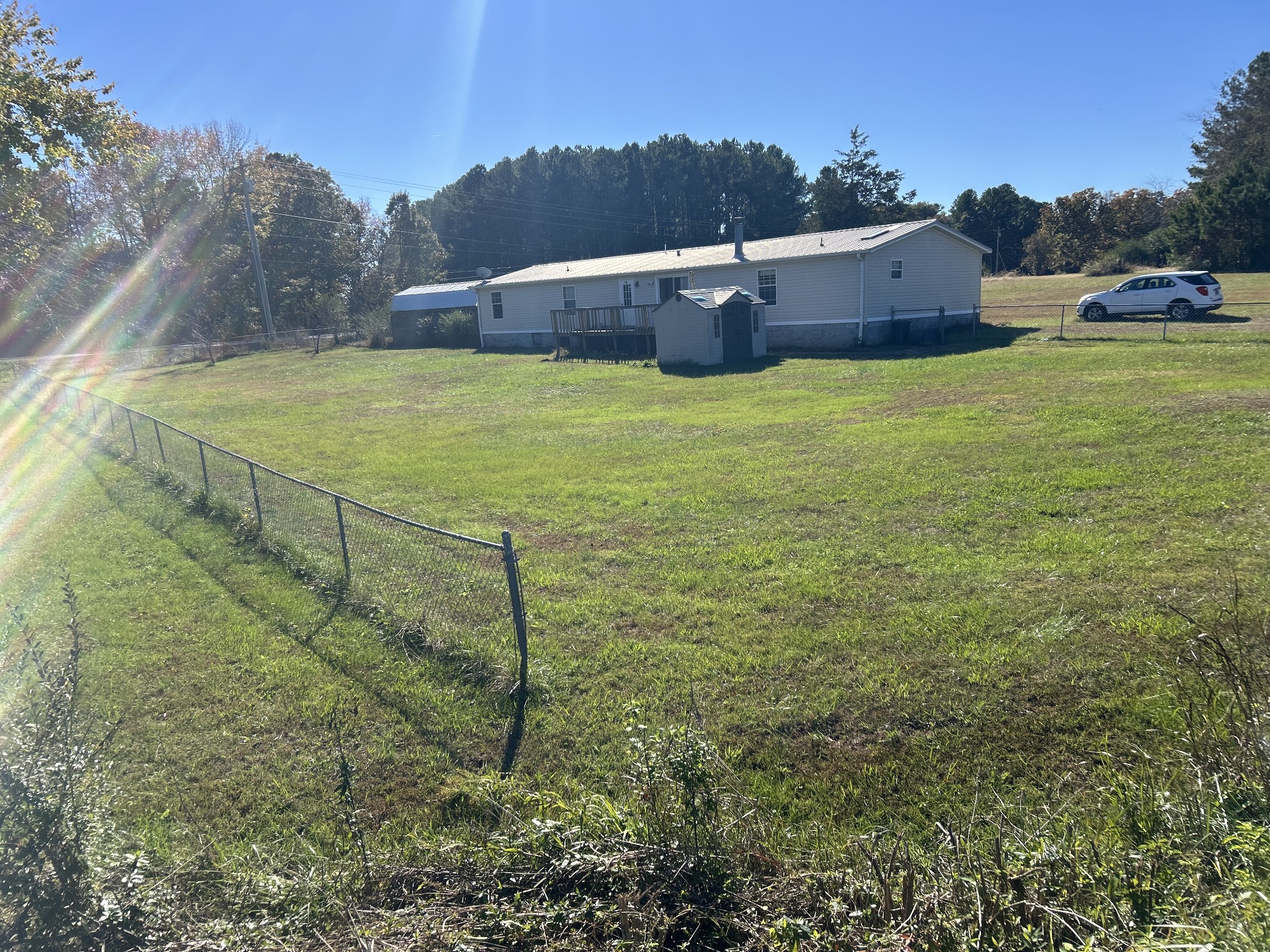 784 Garrison Road Hohenwald, TN 38462 - Photo 35 of 36 a view of a field with an outdoor space