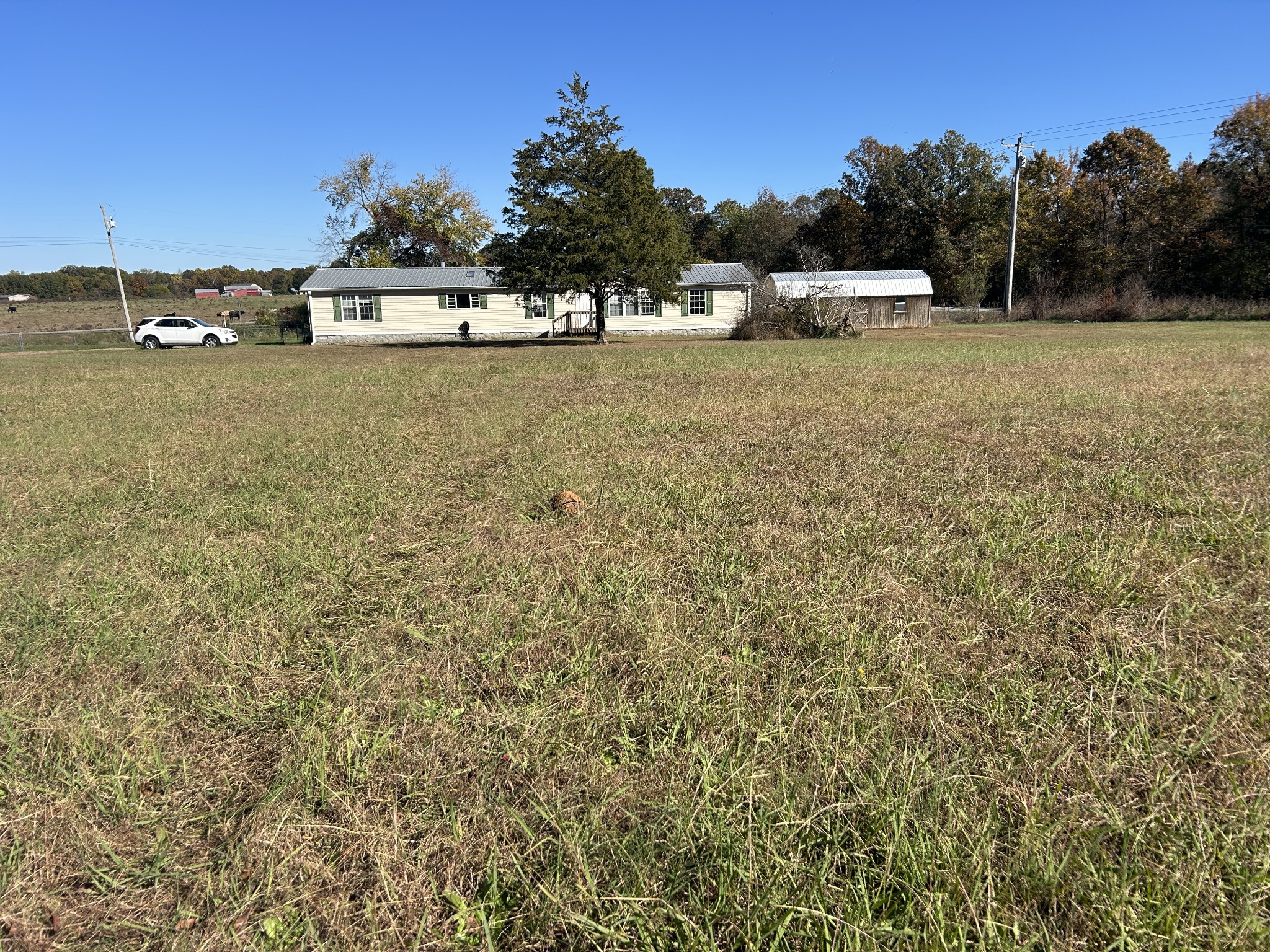 784 Garrison Road Hohenwald, TN 38462 - Photo 5 of 36 a view of a lake with houses