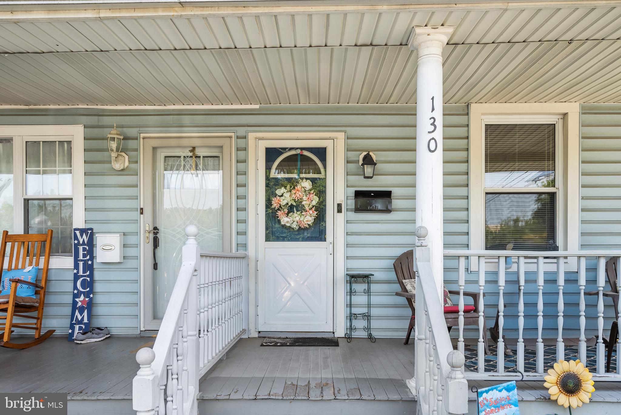 130 Madison Street Riverside, NJ 08075 - Photo 3 of 38 a front view of a house with glass windows