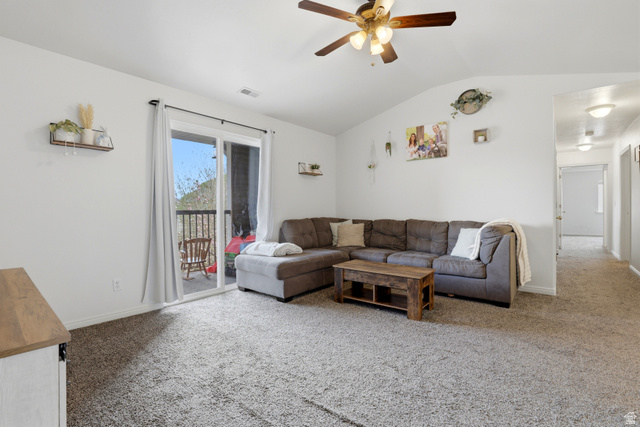 8083 North Ridge Loop East, Unit I 9 Eagle Mountain, UT 84005 - Photo 5 of 17 Living room with a ceiling fan, light colored carpet, and lofted ceiling