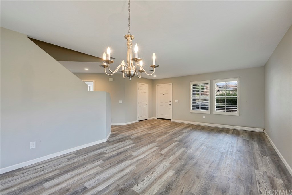 23571 Fallen Boulder Road Menifee, CA 92587 - Photo 12 of 33 a view of livingroom with window