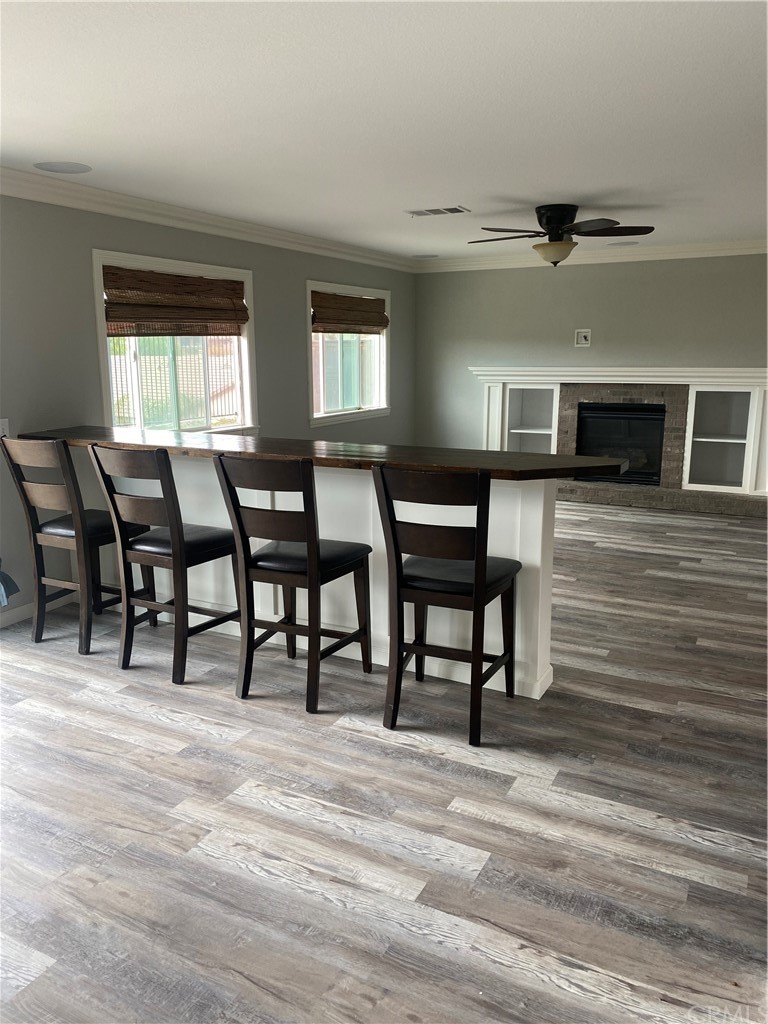 23571 Fallen Boulder Road Menifee, CA 92587 - Photo 17 of 33 a view of a livingroom with furniture and window
