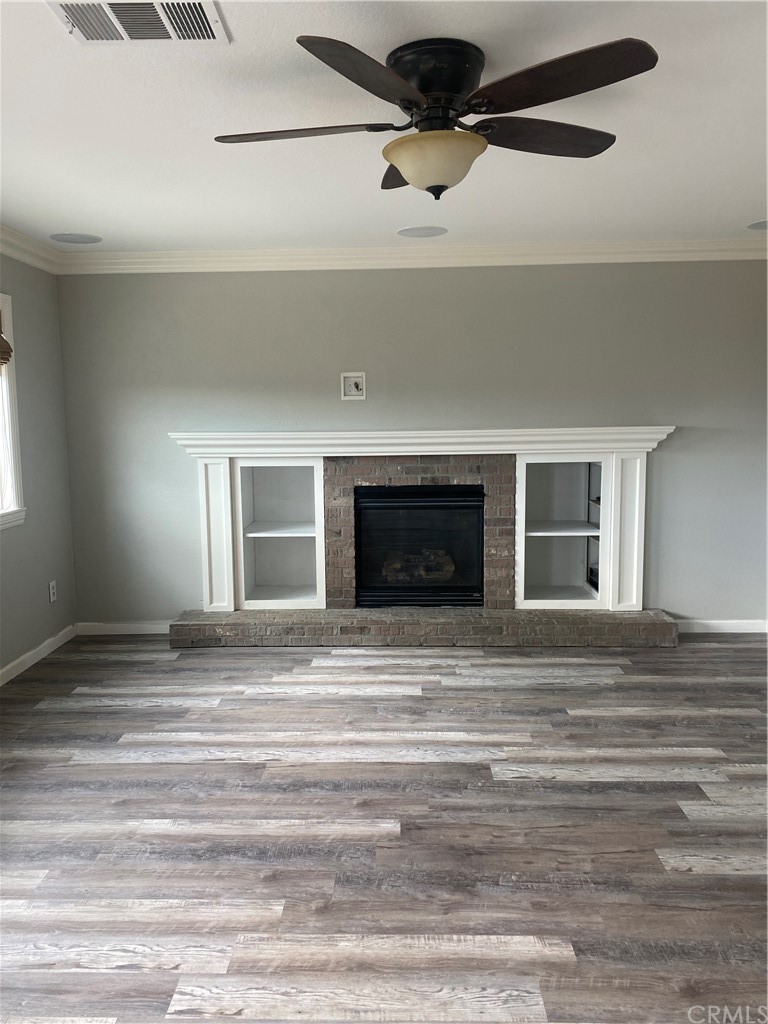 23571 Fallen Boulder Road Menifee, CA 92587 - Photo 18 of 33 a view of a livingroom with a fireplace