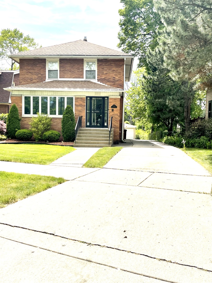 Undisclosed Address Chicago, IL 60643 - Photo 1 of 19 a view of house with outdoor space and swimming pool