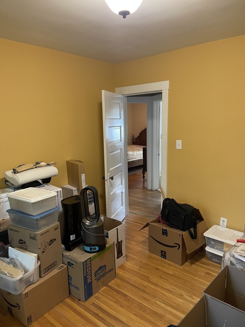 Undisclosed Address Chicago, IL 60643 - Photo 17 of 19 a living room with furniture and a mirror